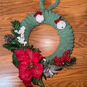 Festive Green Holiday Wreath with Red Accents